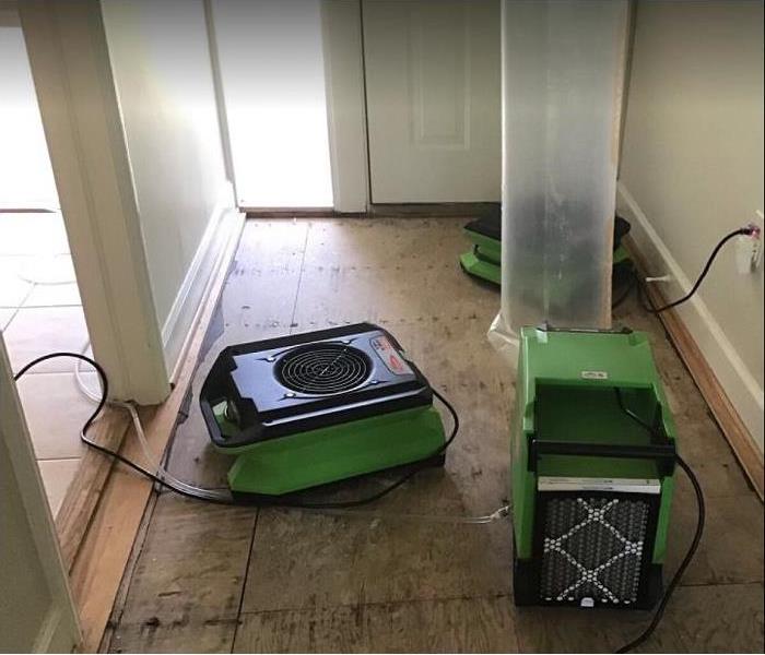 SERVPRO drying equipment being used in water damaged home