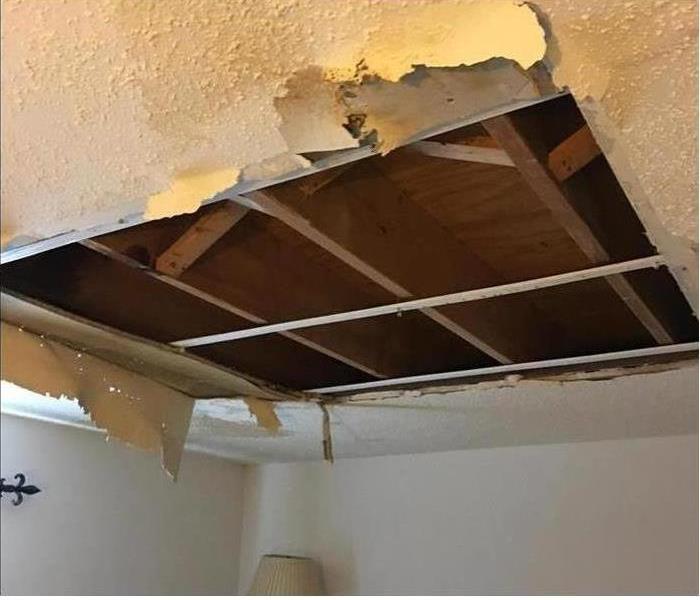 Ceiling caving in from flood damage
