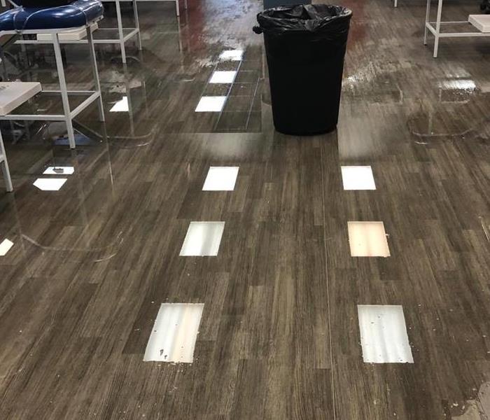 Water that needs to be extracted on the floor from a medical facility
