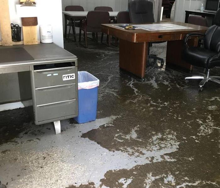 Building flooring with sewage all over the floor due to surge of flooding